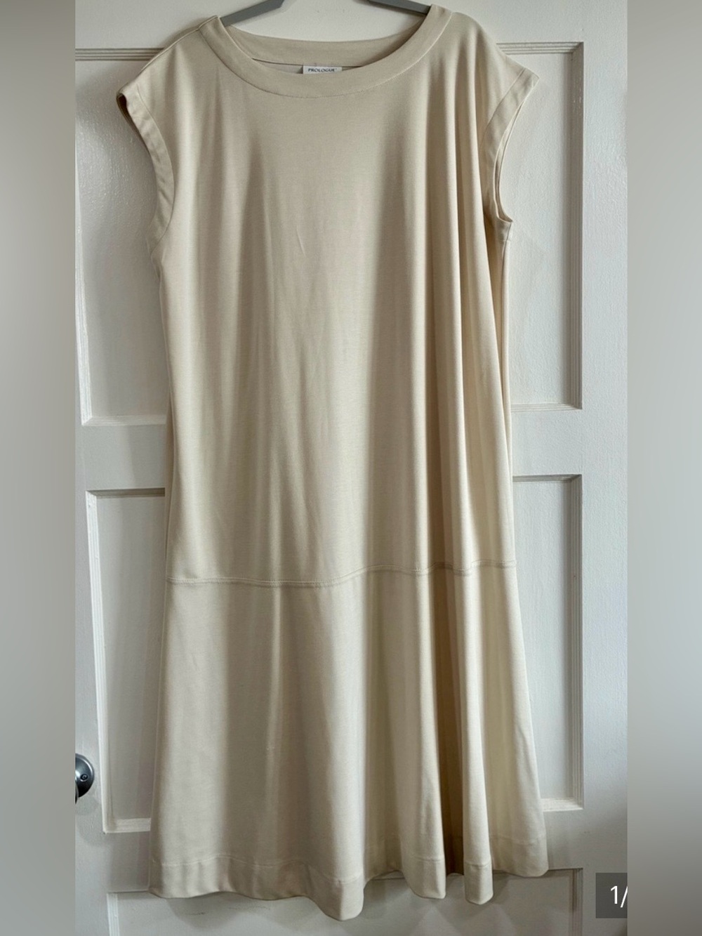 Chic Cream Sleeveless Prologue Midi Dress
